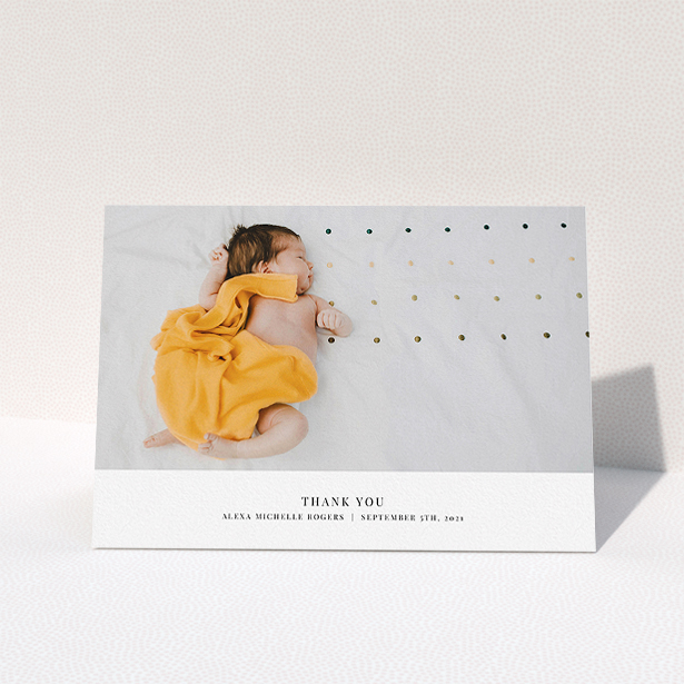 A baby card template titled "A Modern Classic Thank You". It is an A5 card in a landscape orientation. It is a photographic baby card with room for 1 photo. "A Modern Classic Thank You" is available as a folded card, with mainly white colouring.