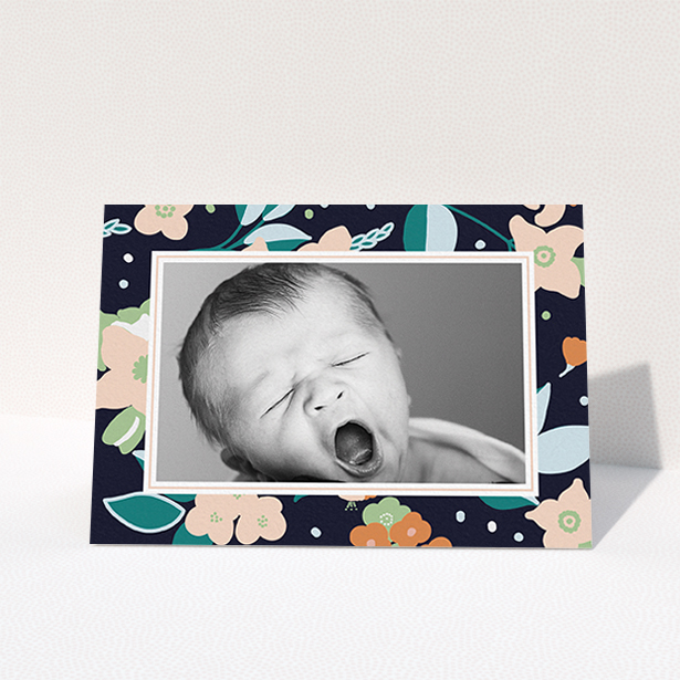 A baby card design titled "Bedtime Garden". It is an A6 card in a landscape orientation. It is a photographic baby card with room for 1 photo. "Bedtime Garden" is available as a folded card, with tones of navy blue, pink and orange.