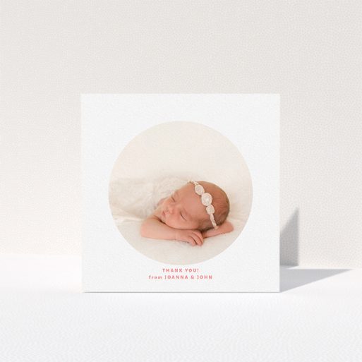 Baby Card Design - "Simple Circle" A baby card template titled "Simple Circle". It is a square (148mm x 148mm) card in a square orientation. It is a photographic baby card with room for 1 photo. "Simple Circle" is available as a folded card, with tones of white and pink.