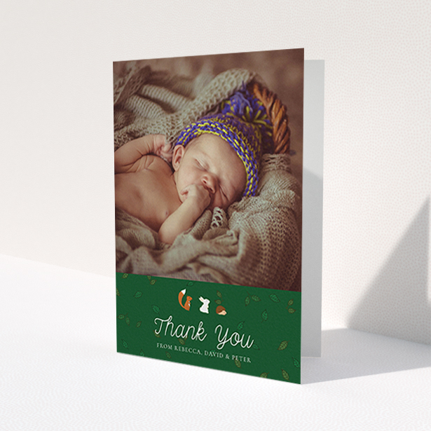 A baby card design titled "Woodland Chums". It is an A6 card in a portrait orientation. It is a photographic baby card with room for 1 photo. "Woodland Chums" is available as a folded card, with tones of green, orange and brown.