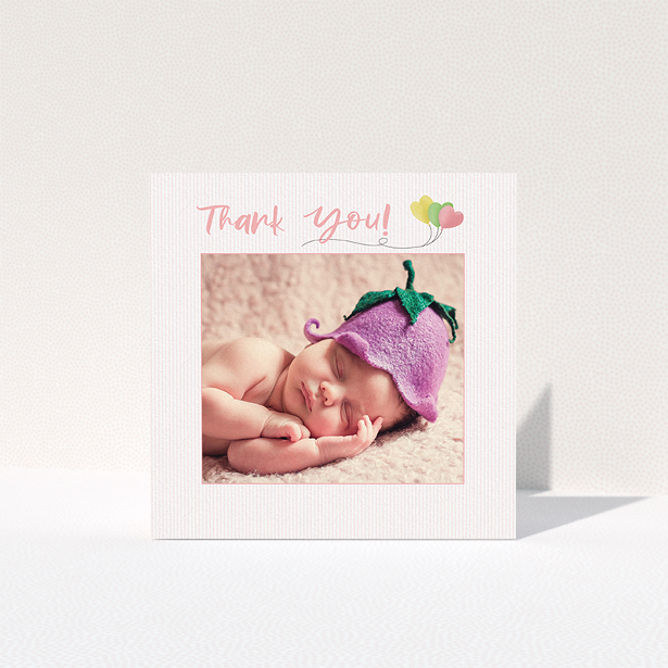 A baby thank you card design called "Balloooons". It is a square (148mm x 148mm) card in a square orientation. It is a photographic baby thank you card with room for 1 photo. "Balloooons" is available as a folded card, with mainly pink colouring.