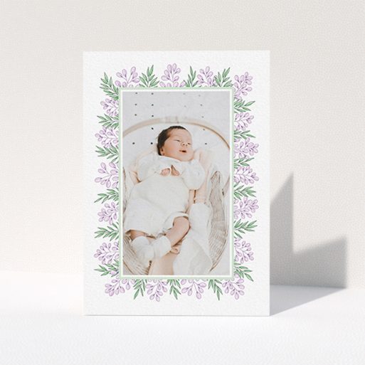 Baby Thank You Card Design - "Floral Frame" A baby thank you card named "Floral Frame". It is an A6 card in a portrait orientation. It is a photographic baby thank you card with room for 1 photo. "Floral Frame" is available as a folded card, with tones of purple and green.
