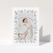 A baby thank you card named "Floral Frame". It is an A6 card in a portrait orientation. It is a photographic baby thank you card with room for 1 photo. "Floral Frame" is available as a folded card, with tones of purple and green.