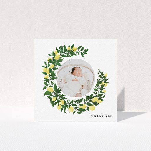 Baby Thank You Card Design - "Lemon Wreath" A baby thank you card design named "Lemon Wreath". It is a square (148mm x 148mm) card in a square orientation. It is a photographic baby thank you card with room for 1 photo. "Lemon Wreath" is available as a folded card, with tones of green and yellow.