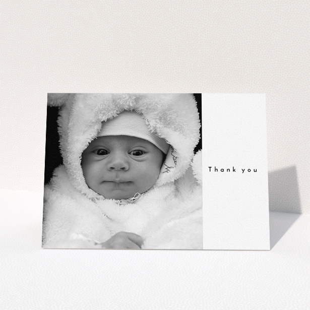 A baby thank you card design called "Most of the Page Frame". It is an A5 card in a landscape orientation. It is a photographic baby thank you card with room for 1 photo. "Most of the Page Frame" is available as a folded card, with mainly white colouring.