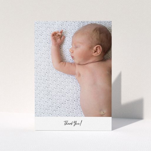 Baby Thank You Card Design - "Mr & Mrs Footer" A baby thank you card design named "Mr & Mrs Footer". It is an A5 card in a portrait orientation. It is a photographic baby thank you card with room for 1 photo. "Mr & Mrs Footer" is available as a folded card, with mainly white colouring.