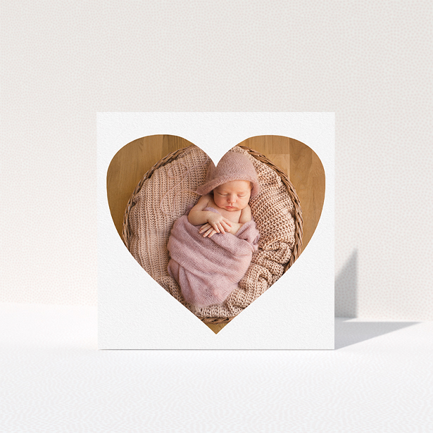 A baby thank you card called "One Big Heart". It is a square (148mm x 148mm) card in a square orientation. It is a photographic baby thank you card with room for 1 photo. "One Big Heart" is available as a folded card, with mainly white colouring.