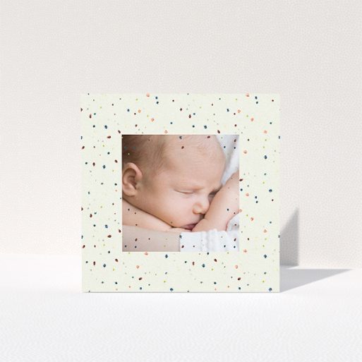 Baby Thank You Card Design - "Pastel Dots" A baby thank you card design called "Pastel Dots". It is a square (148mm x 148mm) card in a square orientation. It is a photographic baby thank you card with room for 1 photo. "Pastel Dots" is available as a folded card, with tones of light cream and green.