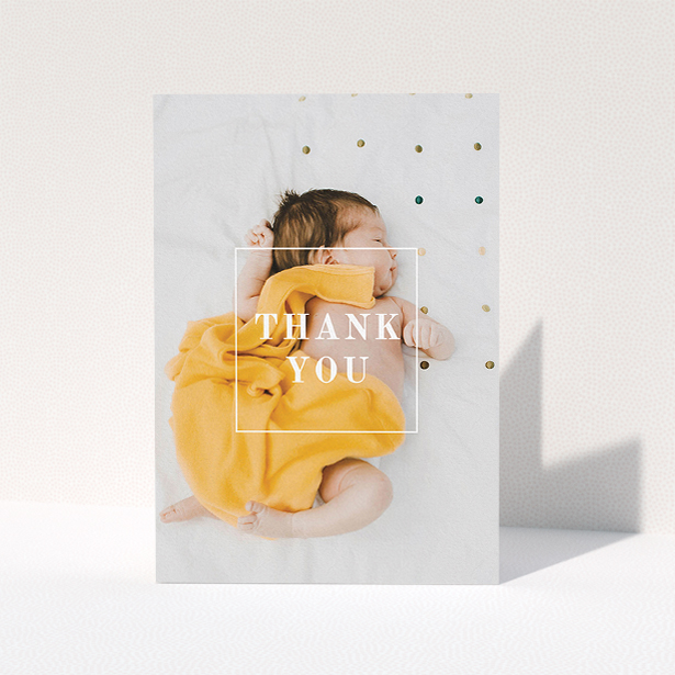 A baptism thank you card design named "Central Thanks". It is an A5 card in a portrait orientation. It is a photographic baptism thank you card with room for 1 photo. "Central Thanks" is available as a folded card, with mainly white colouring.