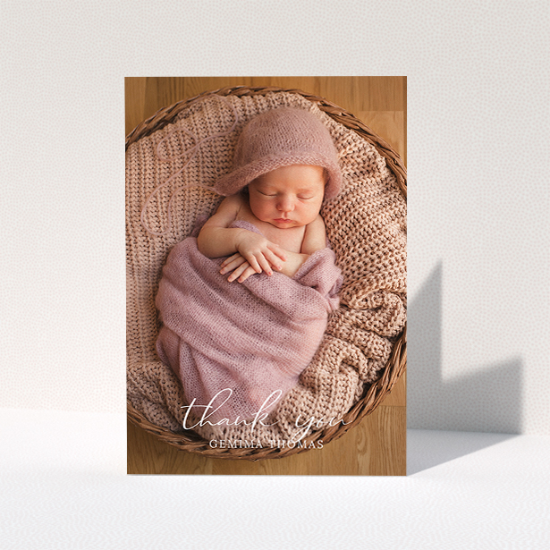 A baptism thank you card template titled "Classic Thank You". It is an A5 card in a portrait orientation. It is a photographic baptism thank you card with room for 1 photo. "Classic Thank You" is available as a folded card, with mainly white colouring.