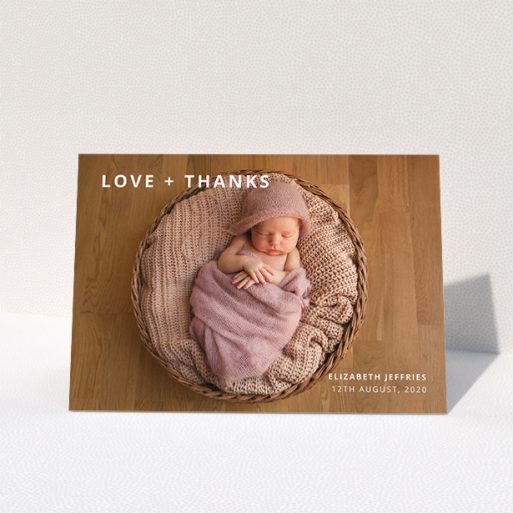Baptism Thank You Card Design - "Love and Thanks Landscape" A baptism thank you card named "Love and Thanks Landscape". It is an A5 card in a landscape orientation. It is a photographic baptism thank you card with room for 1 photo. "Love and Thanks Landscape" is available as a folded card, with mainly white colouring.