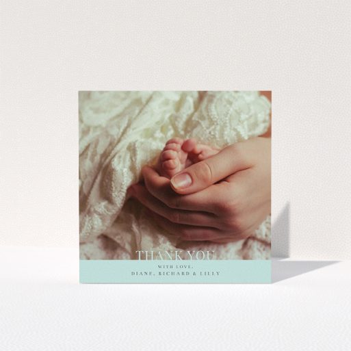 Baptism Thank You Card Design - "Mint Blue Bottom Banner" A baptism thank you card design titled "Mint Blue Bottom Banner". It is a square (148mm x 148mm) card in a square orientation. It is a photographic baptism thank you card with room for 1 photo. "Mint Blue Bottom Banner" is available as a folded card, with mainly blue colouring.