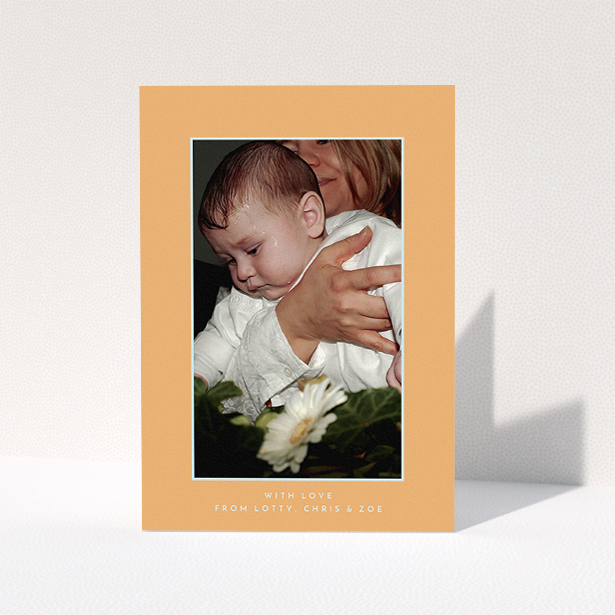 A baptism thank you card called "Orange and Mint". It is an A5 card in a portrait orientation. It is a photographic baptism thank you card with room for 1 photo. "Orange and Mint" is available as a folded card, with tones of orange and blue.