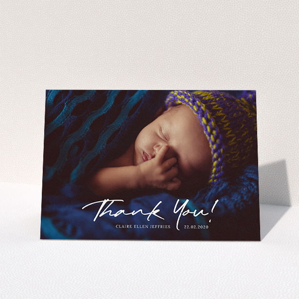 A baptism thank you card called "Simple Appreciation". It is an A5 card in a landscape orientation. It is a photographic baptism thank you card with room for 1 photo. "Simple Appreciation" is available as a folded card, with mainly white colouring.