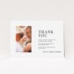 A baptism thank you card template titled "Tiny Portrait". It is an A5 card in a landscape orientation. It is a photographic baptism thank you card with room for 1 photo. "Tiny Portrait" is available as a flat card, with mainly white colouring.