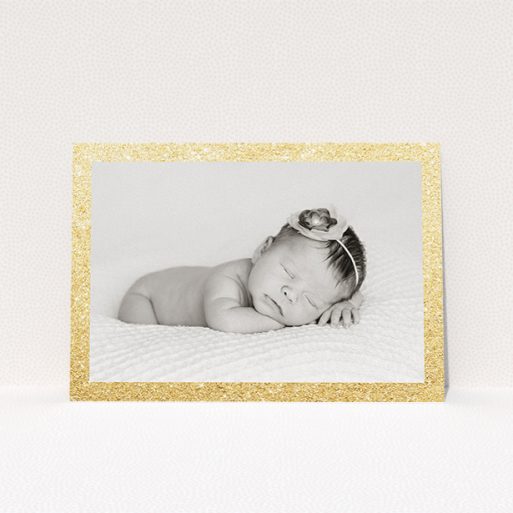 Birth Announcement Card Design - "All that Glitters" A birth announcement card called "All that Glitters". It is an A5 card in a landscape orientation. It is a photographic birth announcement card with room for 1 photo. "All that Glitters" is available as a flat card, with tones of gold and white.