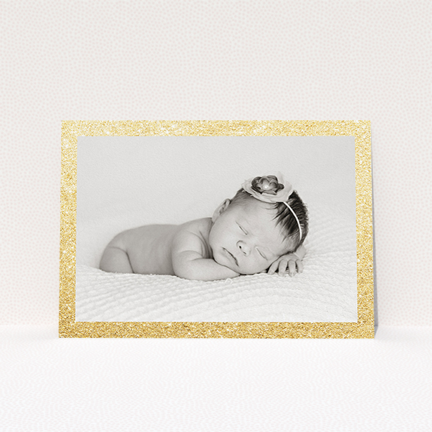 A birth announcement card called "All that Glitters". It is an A5 card in a landscape orientation. It is a photographic birth announcement card with room for 1 photo. "All that Glitters" is available as a flat card, with tones of gold and white.