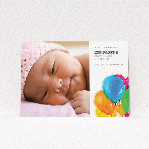 A birth announcement card design titled "Big Balloons". It is an A6 card in a landscape orientation. It is a photographic birth announcement card with room for 1 photo. "Big Balloons" is available as a flat card, with tones of white, orange and blue.