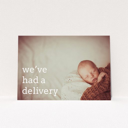 Birth Announcement Card Design - "Delivery" A birth announcement card named "Delivery". It is an A5 card in a landscape orientation. It is a photographic birth announcement card with room for 1 photo. "Delivery" is available as a flat card, with mainly white colouring.