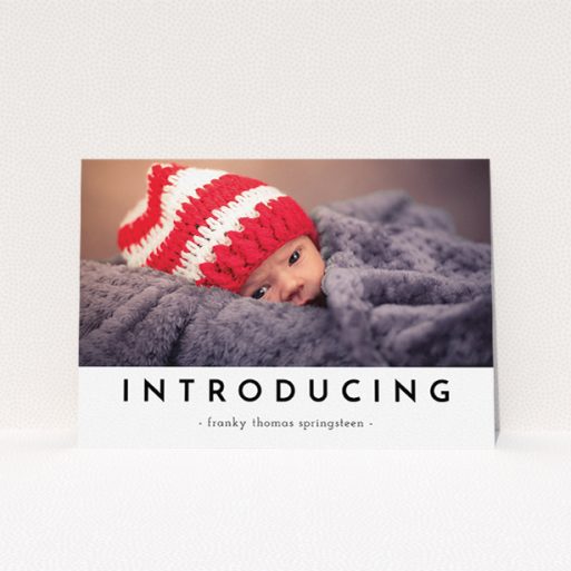 Birth Announcement Card Design - "Introducing" A birth announcement card template titled "Introducing". It is an A5 card in a landscape orientation. It is a photographic birth announcement card with room for 1 photo. "Introducing" is available as a flat card, with mainly white colouring.