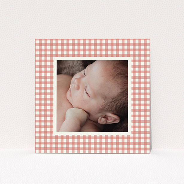 A birth announcement card design titled "Pink Plaid". It is a square (148mm x 148mm) card in a square orientation. It is a photographic birth announcement card with room for 1 photo. "Pink Plaid" is available as a flat card, with tones of pink and white.