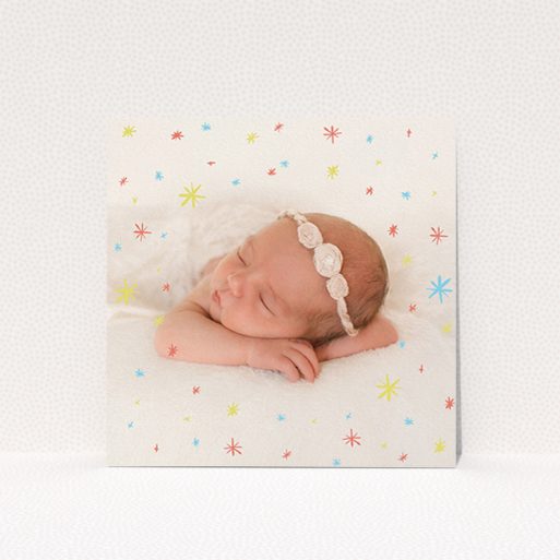 Birth Announcement Card Design - "Playground Stars" A birth announcement card template titled "Playground Stars". It is a square (148mm x 148mm) card in a square orientation. It is a photographic birth announcement card with room for 1 photo. "Playground Stars" is available as a flat card, with mainly red colouring.