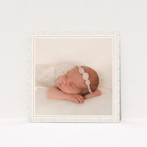 Birth Announcement Card Design - "Sprinkle Frame" A birth announcement card design titled "Sprinkle Frame". It is a square (148mm x 148mm) card in a square orientation. It is a photographic birth announcement card with room for 1 photo. "Sprinkle Frame" is available as a flat card, with tones of cream, red and blue.