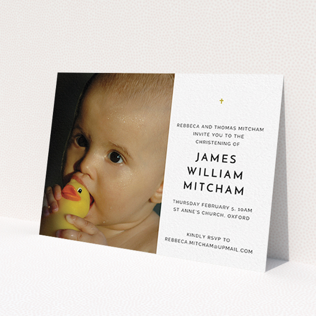 A christening invitation design named "Baby Cross". It is an A6 invite in a landscape orientation. It is a photographic christening invitation with room for 1 photo. "Baby Cross" is available as a flat invite, with tones of white and gold.