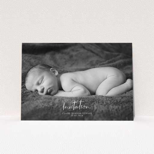Christening Invitation Design - "Central Script" A christening invitation template titled "Central Script". It is an A5 invite in a landscape orientation. It is a photographic christening invitation with room for 1 photo. "Central Script" is available as a flat invite, with mainly white colouring.
