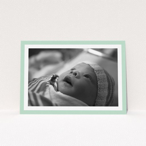 Christening Invitation Design - "Classic Mint Photo Frame" A christening invitation design titled "Classic Mint Photo Frame". It is an A5 invite in a landscape orientation. It is a photographic christening invitation with room for 1 photo. "Classic Mint Photo Frame" is available as a flat invite, with tones of green and white.