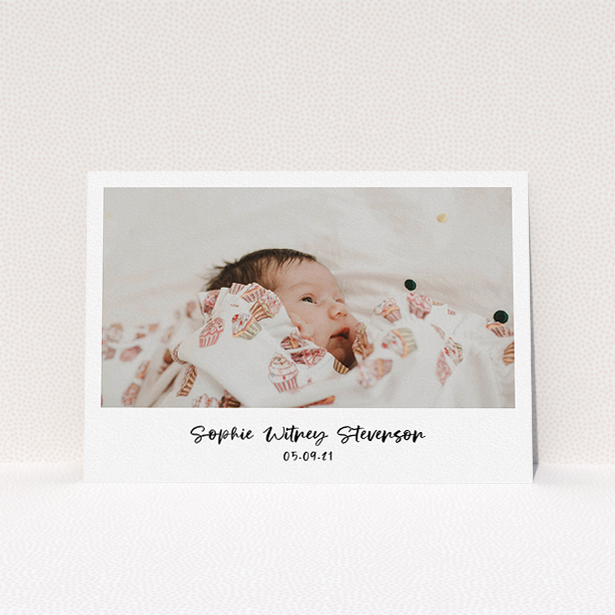 A christening invitation design named "Handwritten Photo". It is an A5 invite in a landscape orientation. It is a photographic christening invitation with room for 1 photo. "Handwritten Photo" is available as a flat invite, with mainly white colouring.