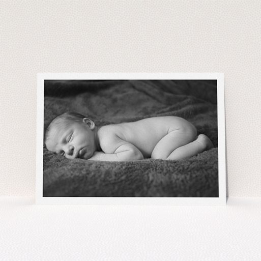 Christening Invitation Design - "Thick White Framed Photo" A christening invitation named "Thick White Framed Photo". It is an A5 invite in a landscape orientation. It is a photographic christening invitation with room for 1 photo. "Thick White Framed Photo" is available as a flat invite, with mainly white colouring.