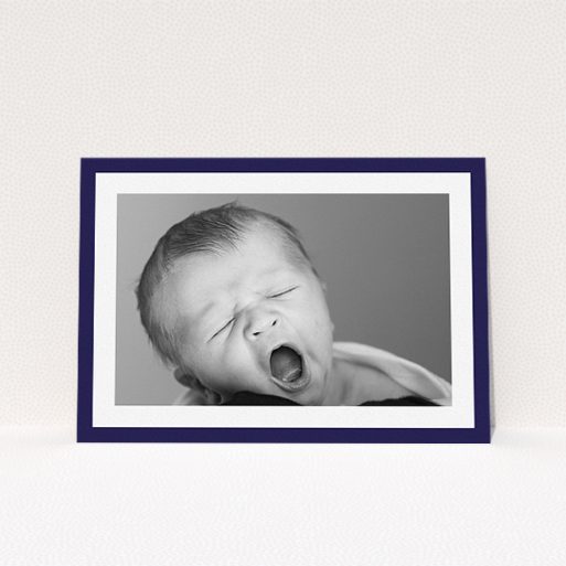 Christening Invite Design - "Classic Navy Photo Frame" A christening invite called "Classic Navy Photo Frame". It is an A5 invite in a landscape orientation. It is a photographic christening invite with room for 1 photo. "Classic Navy Photo Frame" is available as a flat invite, with tones of blue and white.