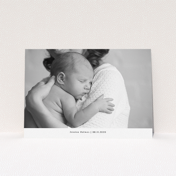 A christening invite design called "Landscape Photo". It is an A5 invite in a landscape orientation. It is a photographic christening invite with room for 1 photo. "Landscape Photo" is available as a flat invite, with mainly white colouring.