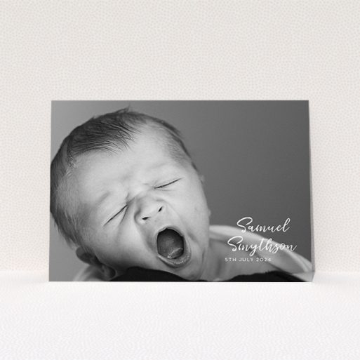 Christening Invite Design - "Soho Script" A christening invite design titled "Soho Script". It is an A5 invite in a landscape orientation. It is a photographic christening invite with room for 1 photo. "Soho Script" is available as a flat invite, with mainly white colouring.