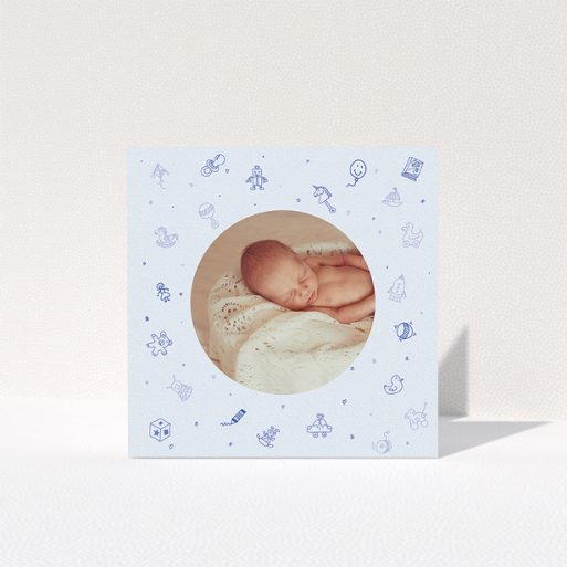 Christening Thank You Card Design - "All the toys" A christening thank you card named "All the toys". It is a square (148mm x 148mm) card in a square orientation. It is a photographic christening thank you card with room for 1 photo. "All the toys" is available as a folded card, with mainly blue colouring.