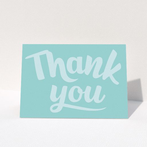 Christening Thank You Card Design - "Big Blue Typography" A christening thank you card named "Big Blue Typography". It is an A5 card in a landscape orientation. "Big Blue Typography" is available as a folded card, with mainly blue colouring.