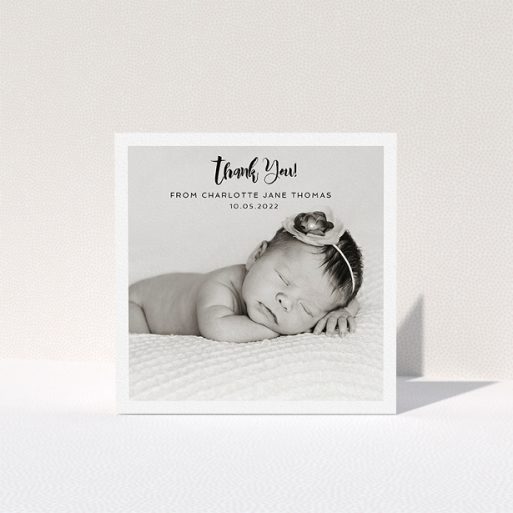 Christening Thank You Card Design - "Bordered Photo Square" A christening thank you card design called "Bordered Photo Square". It is a square (148mm x 148mm) card in a square orientation. It is a photographic christening thank you card with room for 1 photo. "Bordered Photo Square" is available as a folded card, with mainly white colouring.