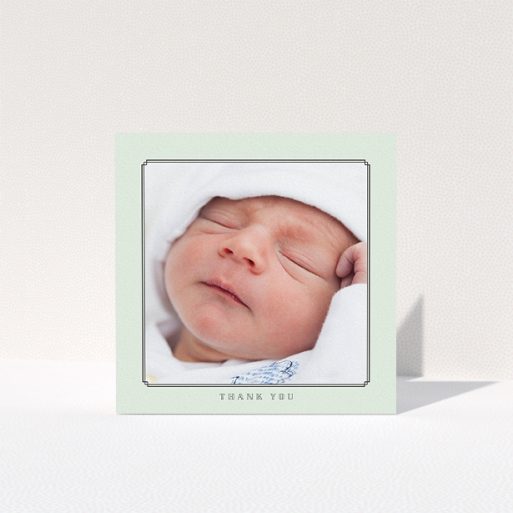 Christening Thank You Card Design - "Mint Deco" A christening thank you card design titled "Mint Deco". It is a square (148mm x 148mm) card in a square orientation. It is a photographic christening thank you card with room for 1 photo. "Mint Deco" is available as a folded card, with tones of green and white.