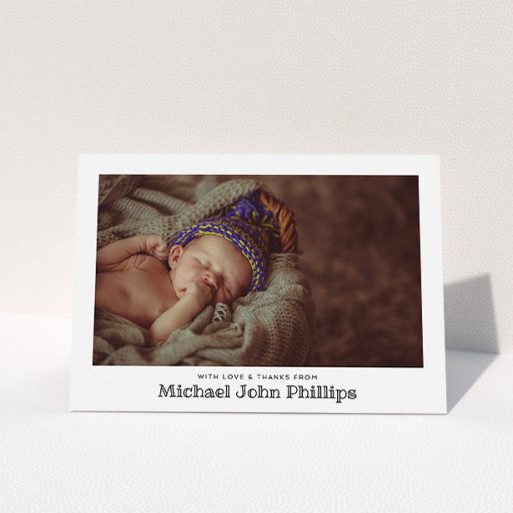 Christening Thank You Card Design - "Simple Photo Frame" A christening thank you card named "Simple Photo Frame". It is an A5 card in a landscape orientation. It is a photographic christening thank you card with room for 1 photo. "Simple Photo Frame" is available as a folded card, with mainly white colouring.