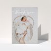 A christening thank you card called "Topped and Bottomed". It is an A5 card in a portrait orientation. It is a photographic christening thank you card with room for 1 photo. "Topped and Bottomed" is available as a folded card, with mainly white colouring.