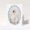 A christening thank you card design titled "Tussled Wreath". It is an A6 card in a portrait orientation. It is a photographic christening thank you card with room for 1 photo. "Tussled Wreath" is available as a folded card, with tones of blue and white.