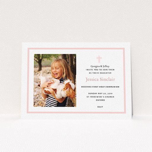 Communion Invitation Design - "Baby Pink Cross" A communion invitation template titled "Baby Pink Cross". It is an A6 invite in a landscape orientation. It is a photographic communion invitation with room for 1 photo. "Baby Pink Cross" is available as a flat invite, with tones of pink and white.