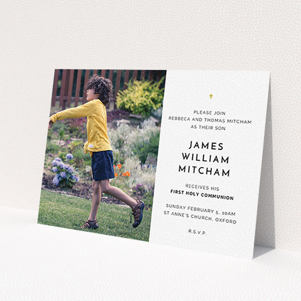 A communion invite card named "Tiny Cross". It is an A6 invite in a landscape orientation. It is a photographic communion invite card with room for 1 photo. "Tiny Cross" is available as a flat invite, with tones of white and gold.