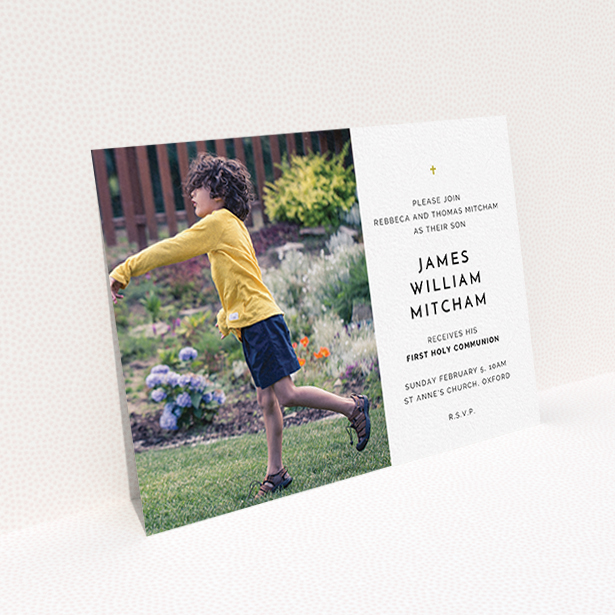 A communion invite card named "Tiny Cross". It is an A6 invite in a landscape orientation. It is a photographic communion invite card with room for 1 photo. "Tiny Cross" is available as a flat invite, with tones of white and gold.