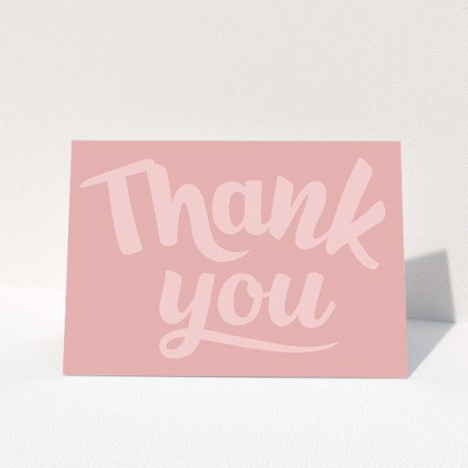 Communion Thank You Card Design - "Big Pink Typography" A communion thank you card design called "Big Pink Typography". It is an A5 card in a landscape orientation. "Big Pink Typography" is available as a folded card, with mainly pink colouring.