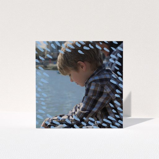 Communion Thank You Card Design - "Blue Daubs" A communion thank you card called "Blue Daubs". It is a square (148mm x 148mm) card in a square orientation. It is a photographic communion thank you card with room for 1 photo. "Blue Daubs" is available as a folded card, with mainly blue colouring.