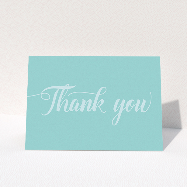 A communion thank you card design named "Blue on Blue Typography". It is an A5 card in a landscape orientation. "Blue on Blue Typography" is available as a folded card, with mainly blue colouring.