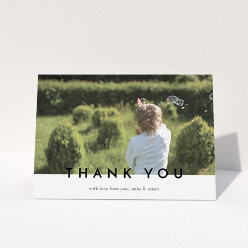 Communion Thank You Card Design - "Cross Border" A communion thank you card design titled "Cross Border". It is an A6 card in a landscape orientation. It is a photographic communion thank you card with room for 1 photo. "Cross Border" is available as a folded card, with mainly white colouring.