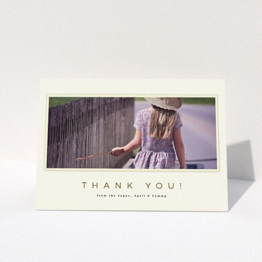 Communion Thank You Card Design - "Torn Cream Frame" A communion thank you card design titled "Torn Cream Frame". It is an A5 card in a landscape orientation. It is a photographic communion thank you card with room for 1 photo. "Torn Cream Frame" is available as a folded card, with mainly cream colouring.